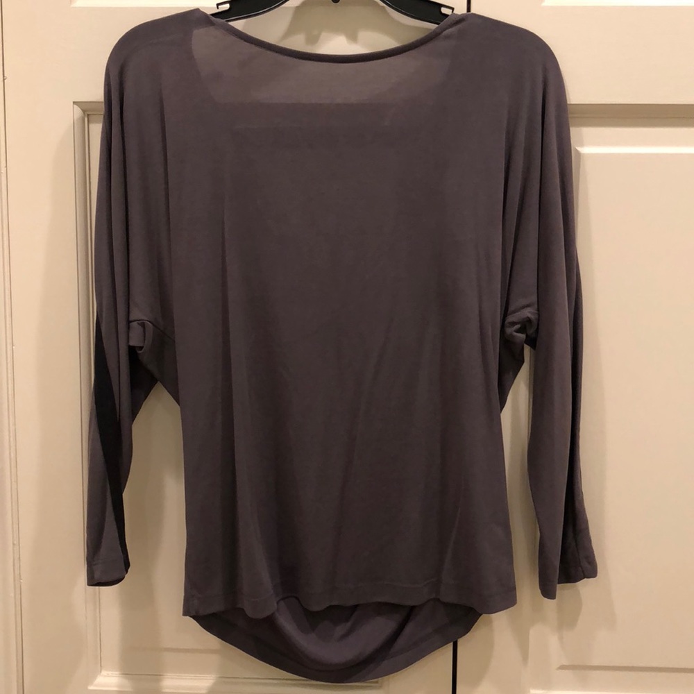 Gray shirt with low back and black stripe